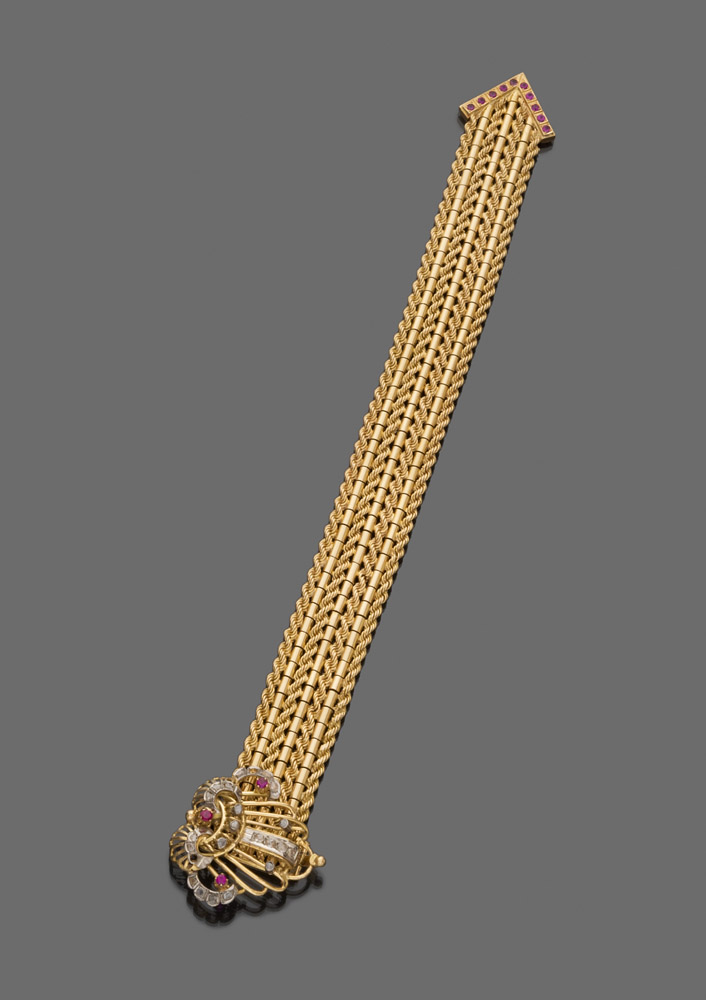 Yellow gold 18 kt. bracelet. Length cm. 23, rubies ct. 0.40, brilliant ct. Approx. 0.40, total