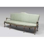 Walnut-tree Sofa, probably Lombardy 18th century. Measures cm. 104 x 230 x 62.DIVANO IN NOCE,