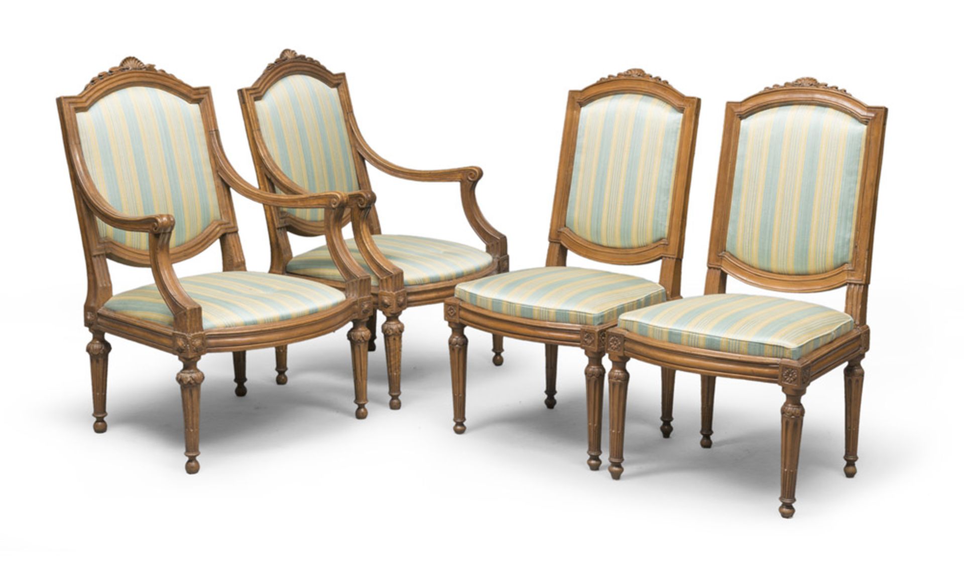 Set of a pair of clear walnut-tree armchairs and two chairs, late of period of Louis XVI. Measures