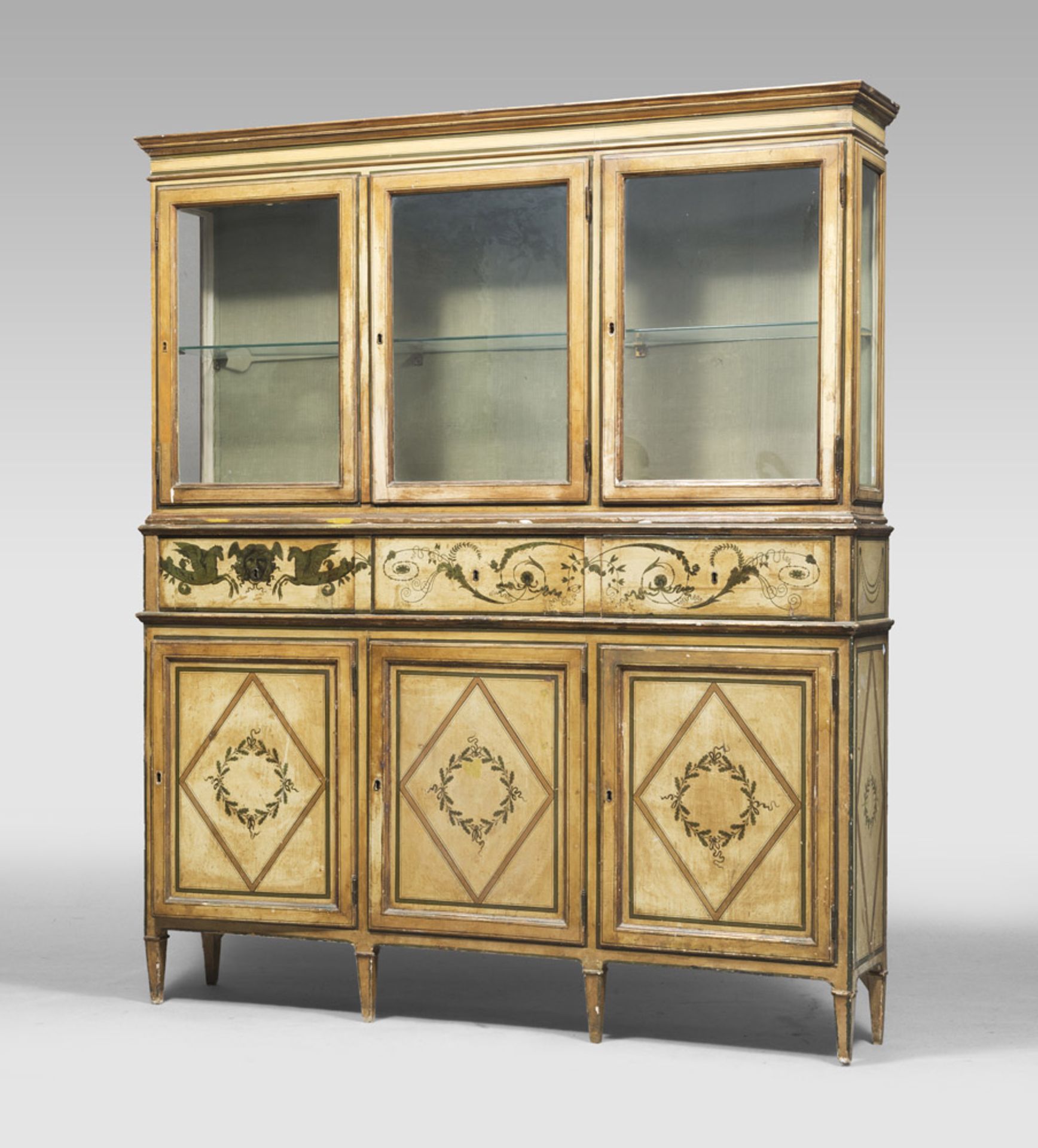 Lacquered and painted wood showcase-cabinet, early 19th century. Measures cm. 220 x 190 x 33.RARA