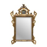 Giltwood mirror, elements of the 18th century. Measures cm. 114 x 77.SPECCHIERA IN LEGNO DORATO,