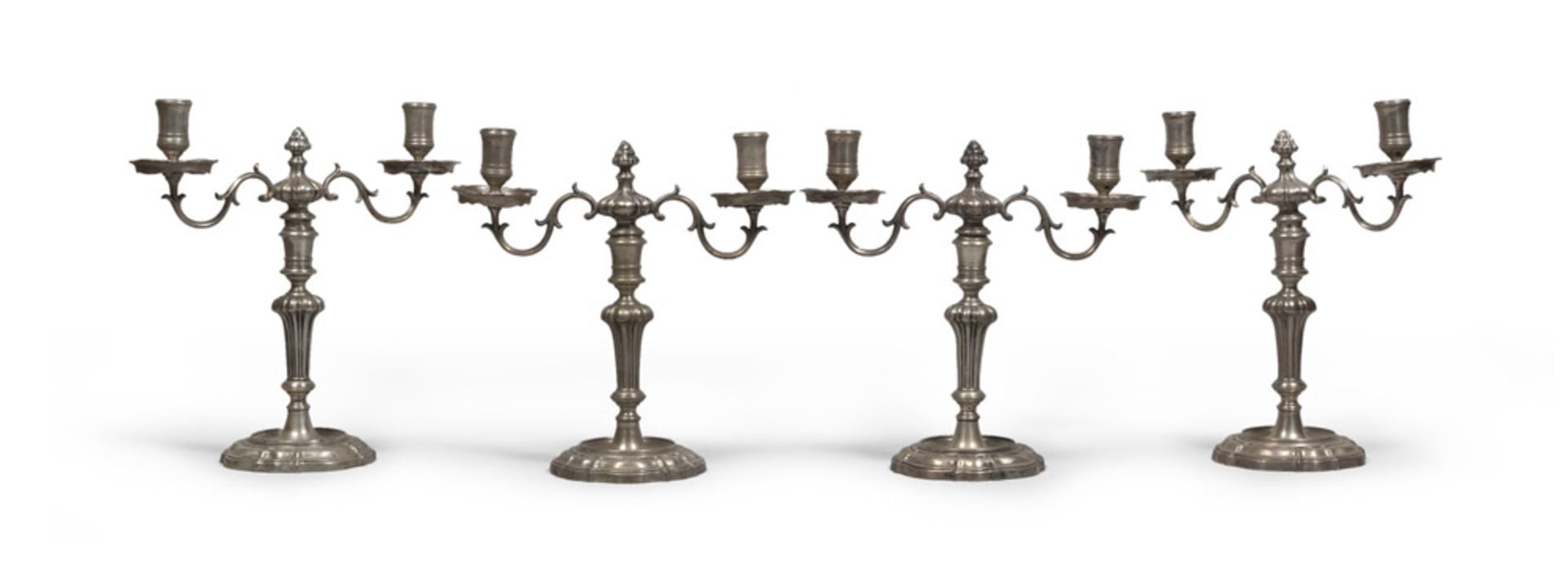 Four silver candelabra, Punch Venice Republic 18th century. Title 800/1000. Measures cm. 30 x 30 x