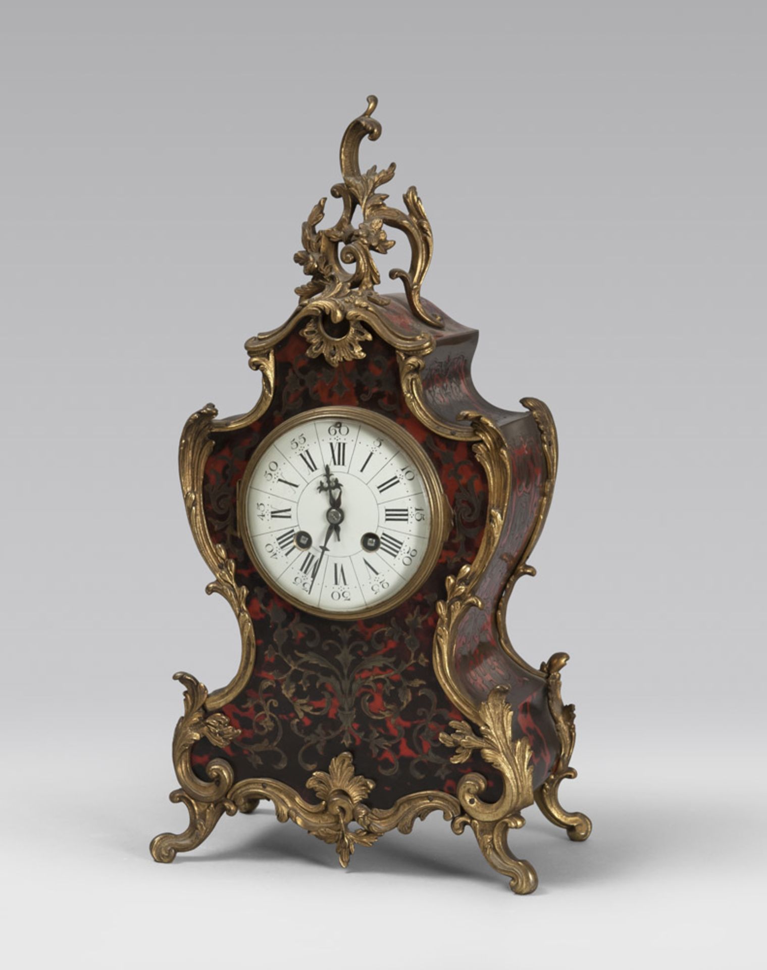 Table clock, style Boulle, France early 20th century. Measures cm. 44 x 23 x 14.OROLOGIO DA