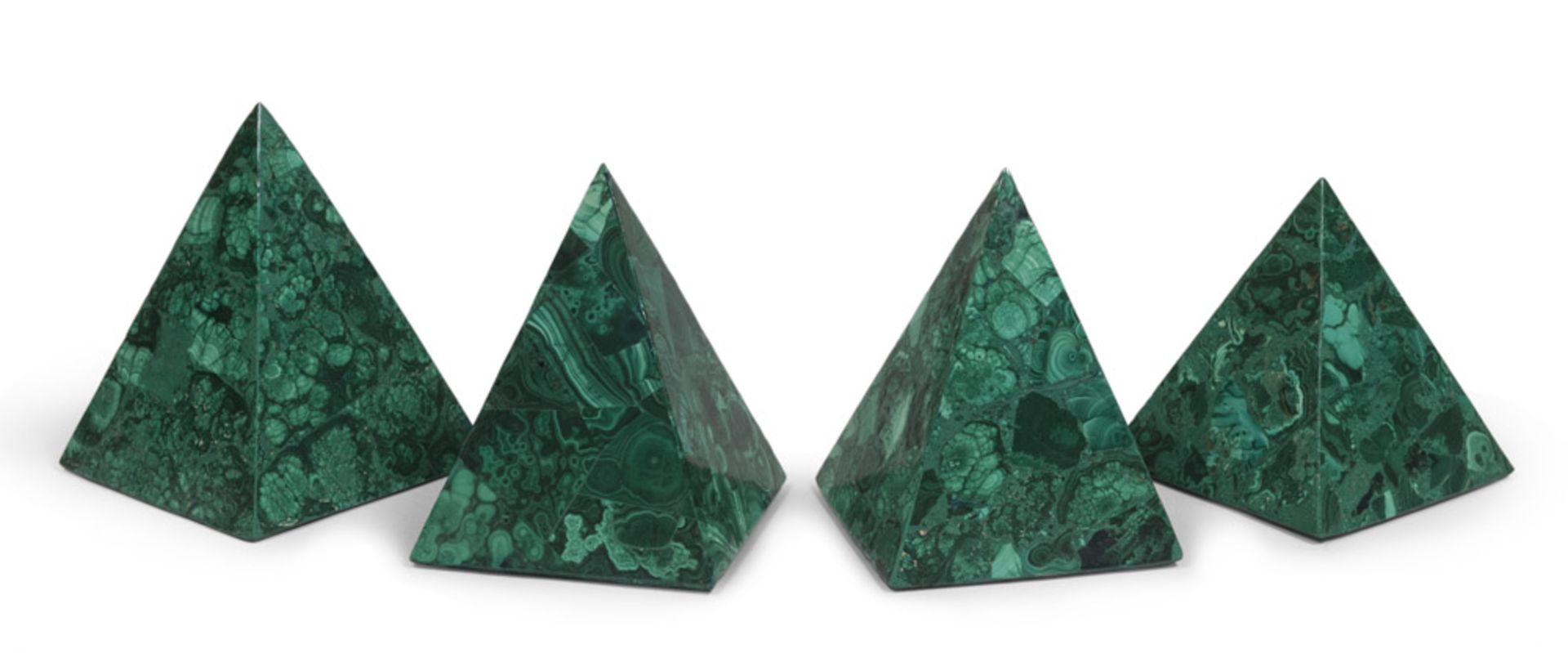 Four electroplated pyramids in malachite with wooden stem, 20th century.