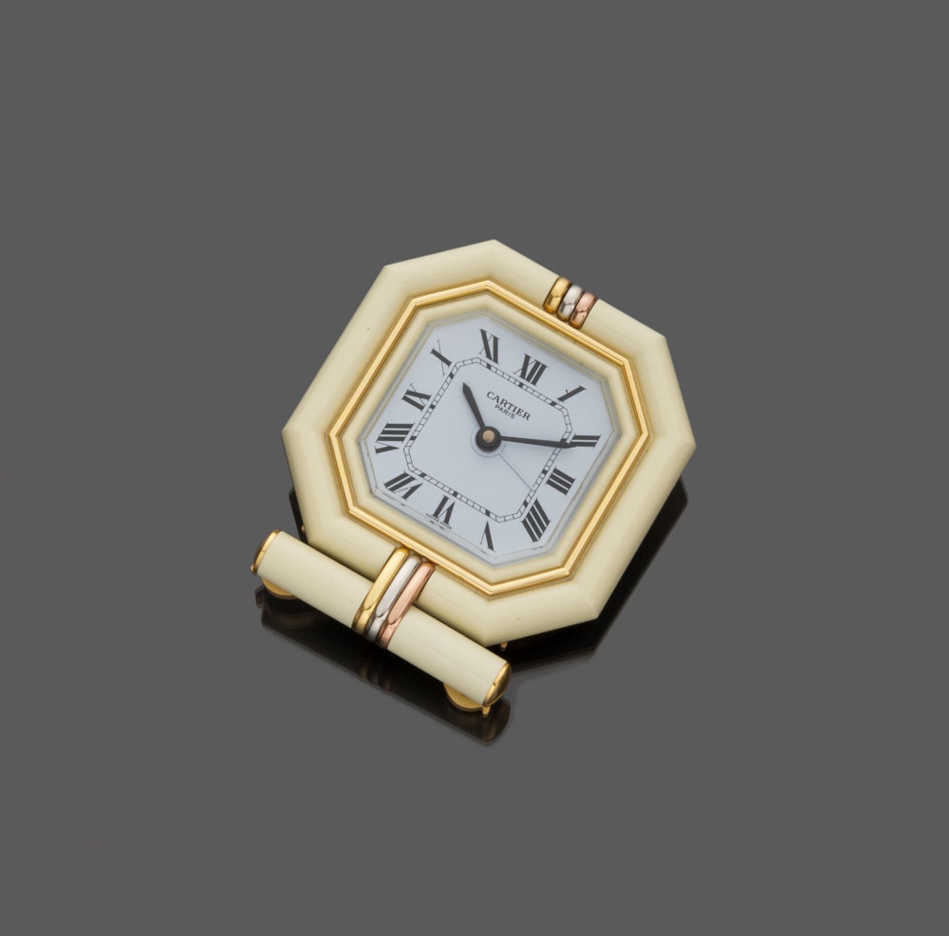 TABLE watch PENDULETTE MUST DE CARTIER in brass and enamel, with rolled insertions in yellow gold,