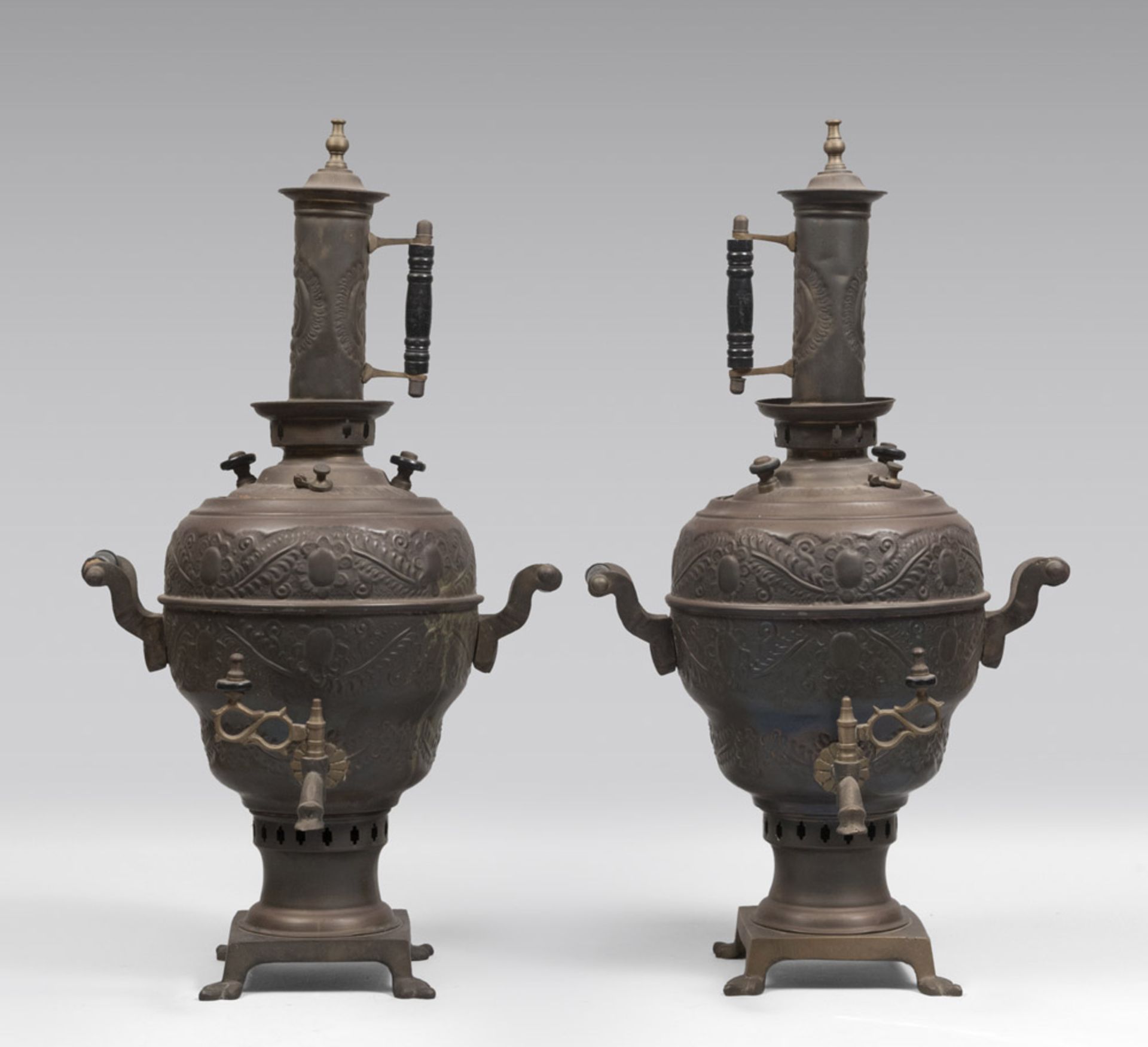 A pair of copper and brass samovar, late 19th century. Measures cm. 70 x 40 x 35. COPPIA DI