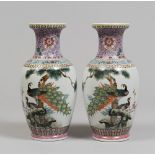 A PAIR OF CHINESE POLYCHROME PORCELAIN VASES, 20TH CENTURY