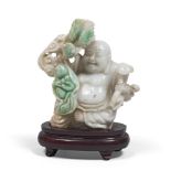 A CHINESE SERPENTINE SCULPTURE, 20TH CENTURY depicting Budai. Measures cm. 11 x 11,5 x 5,5. SCULTURA