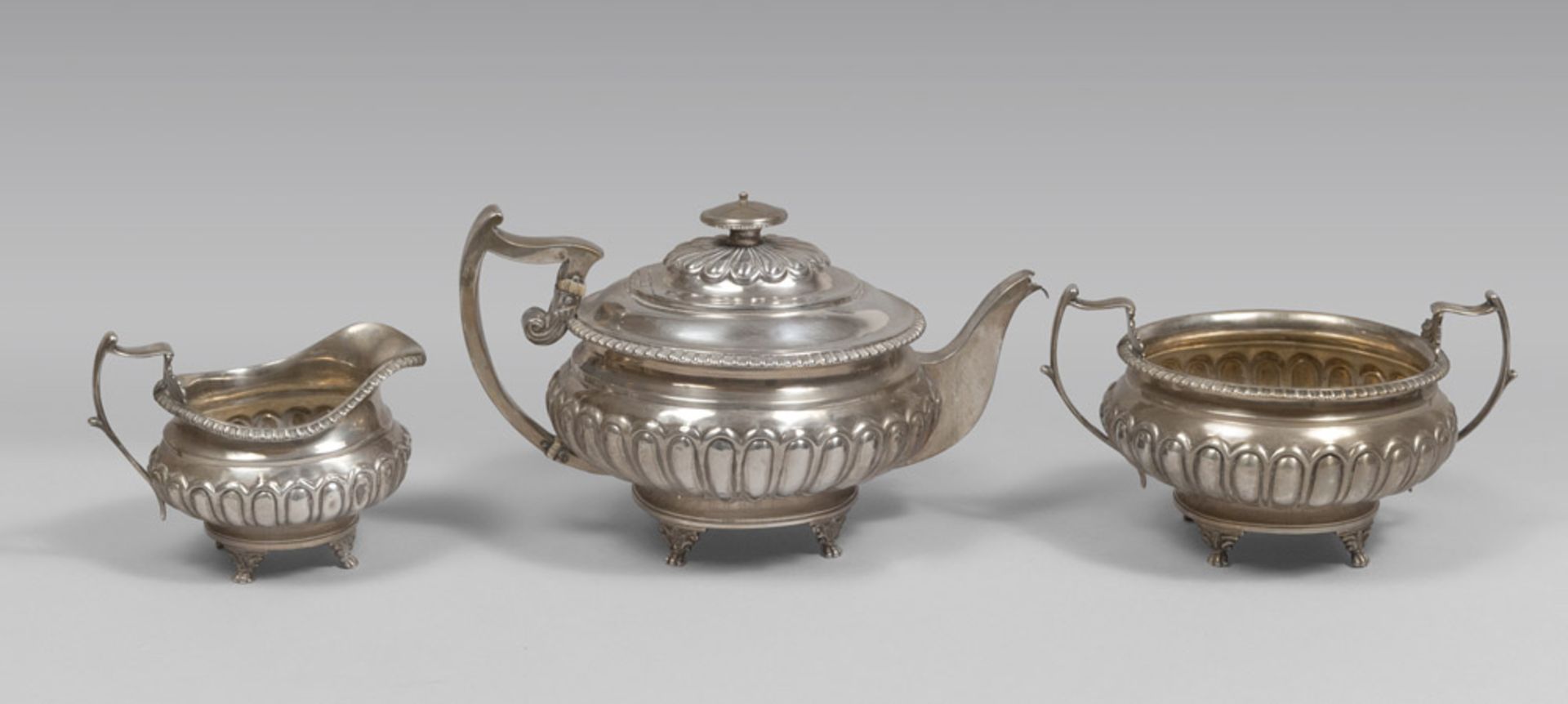 Three silverware pieces, composed of teapot, milk-pot and sugar bowl, punch Dublin 1813. Silversmith