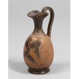 Lekythos Etruscan orange clay, 6th-5th century BC Measures cm. 16 x 8. LEKYTOS ETRUSCA, VI - V