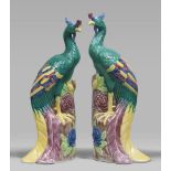 A pair of Chinese porcelaine sculptures, depicting two Phoenix. 20th century. Measures cm. 35 x 10 x