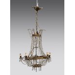 Gilded metal chandelier, 19th century. Measures cm. 110 x 70. LAMPADARIO A CAMPANA, XIX SECOLO in