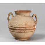 A DAUNIAN CRATER, 6TH-4TH CENTURY B.C. red clay, slip beige and brown glaze.