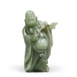 A CHINESE SERPENTINE SCULPTURE, 20TH CENTURY depicting Budai.