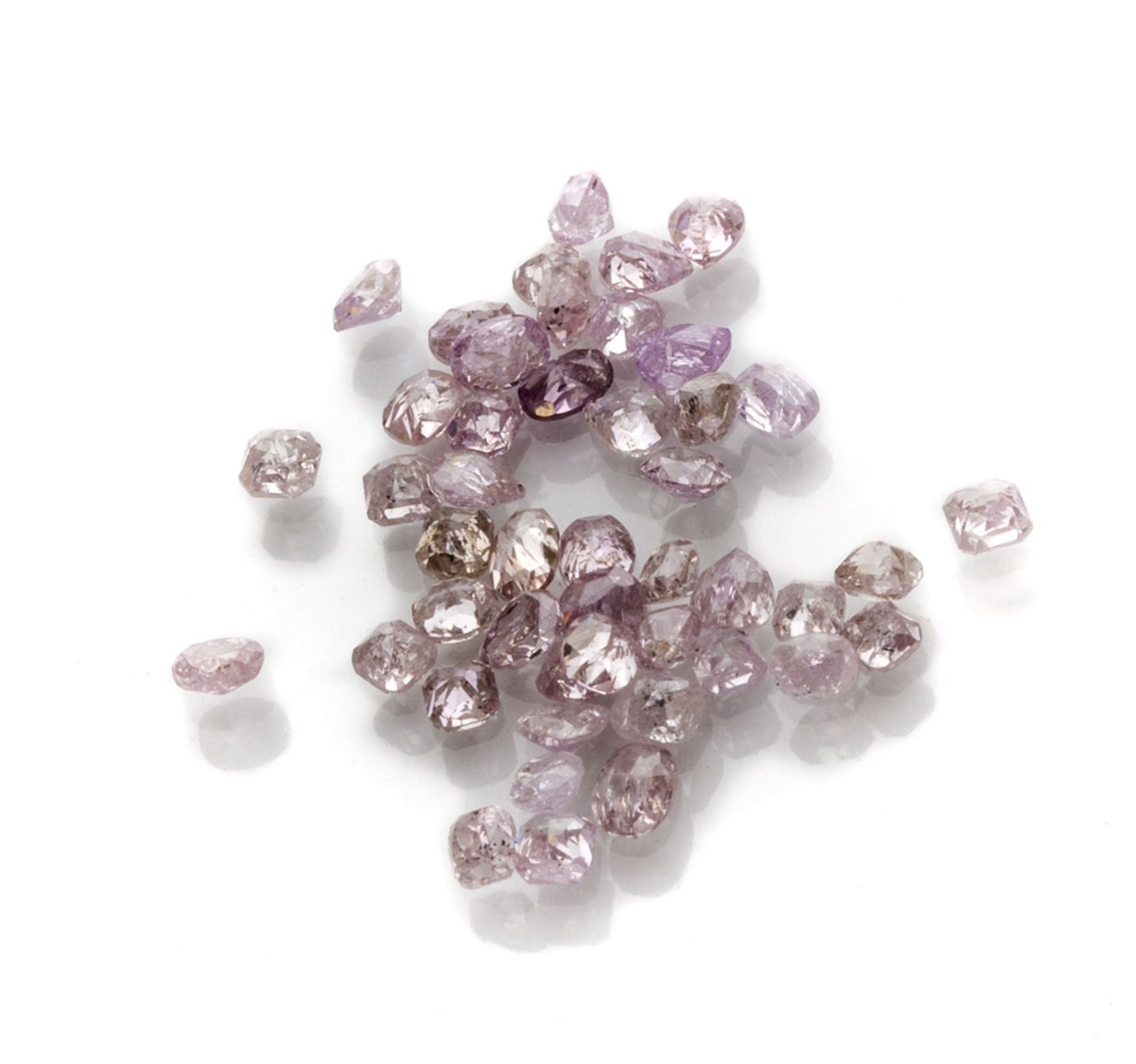 FORTY-FIVE NATURAL DIAMONDS of various cuts. Bright ct. 4.30, color Pink. In case. QUARANTACINQUE