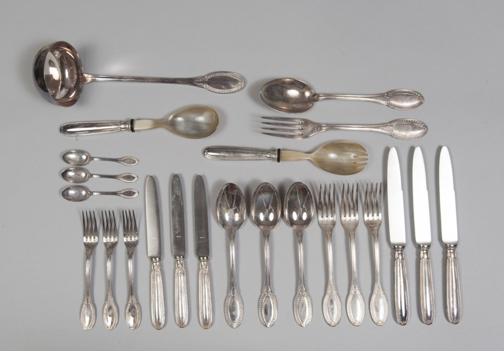 SET OF SILVER CUTLERY, 20TH CENTURY Composed by twelve spoons, twelve forks, twelve knives, twelve