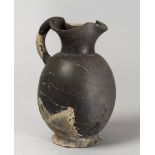 ETRUSCAN OINOCHOE 6TH CENTURY B.C. gray fence bucchero. smooth edge trefoil, cylindrical neck, ovoid