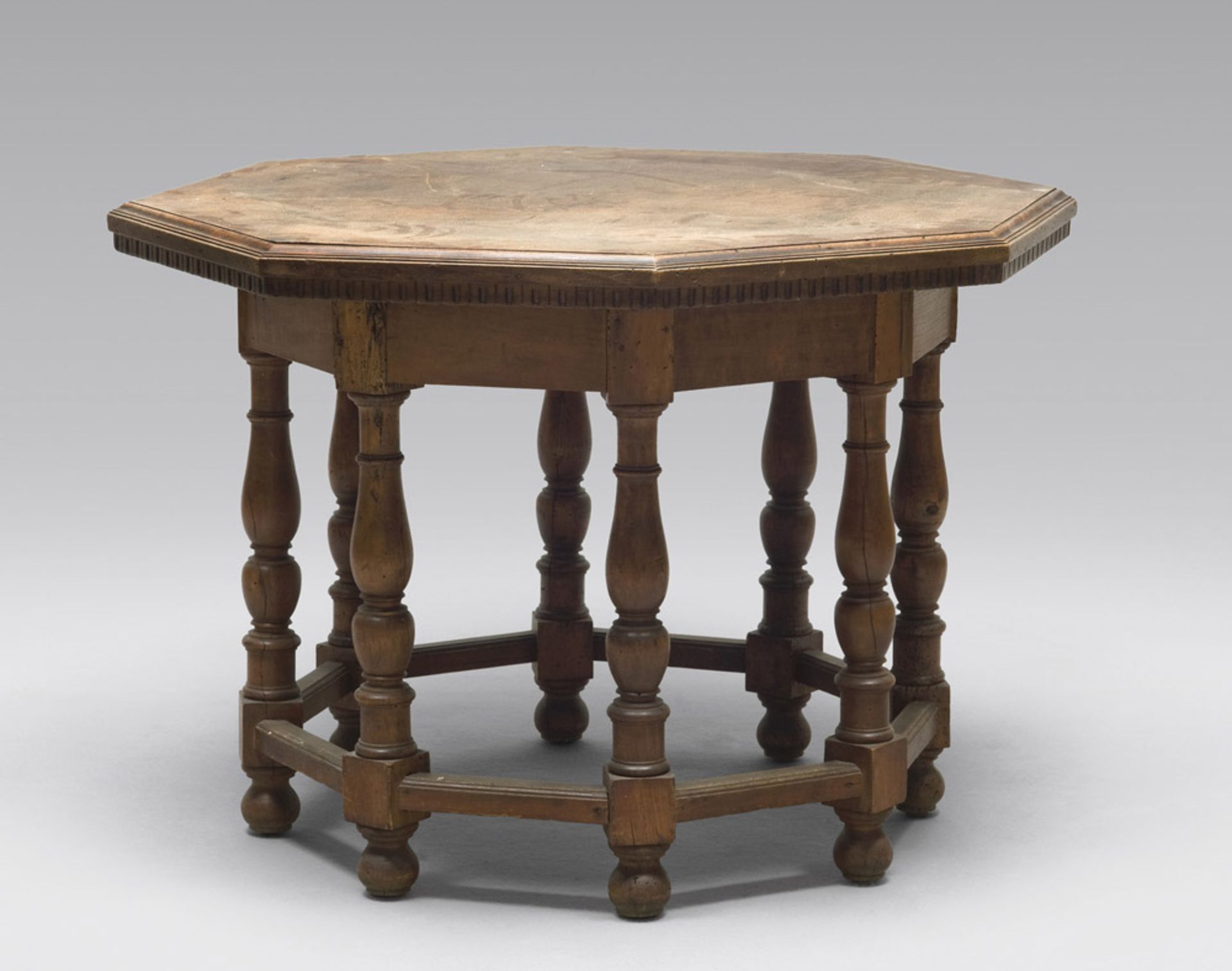 Composite octagonal table in walnut and walnut wood with base of the eighteenth century, top of