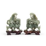 A PAIR OF CHINESE JADE SCULPTURES, 20TH CENTURY Measures cm. 13,5 x 13,5 x 6. COPPIA DI SCULTURE