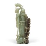 A CHINESE SERPENTINE SCULPTURE, 20TH CENTURY depicting Lao Shouxing.