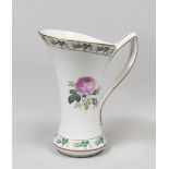 PORCELAIN PITCHER, PROBABLY FRANCE MID 20TH. CENTURY white enamel with flower decoration. Brand in