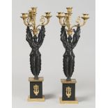 COUPLE OF CANDELABRI IN BRONZE, MIDDLE XX YEAR of Louis XVI style, with stems of winged winged