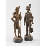 A PAIR OF BRONZE SCULPTURES, EARLY 20TH CENTURY representing officer and fuciliere Hussars.