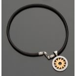 BULGARI NECKLACE in steel and yellow gold 18 kt., with oval shaped pendant with the symbol of the