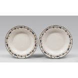 RARE PAIR OF DISHES, FRANCE SARREGUEMINES EARLY 19TH CENTURY painted on white enamel with a vase