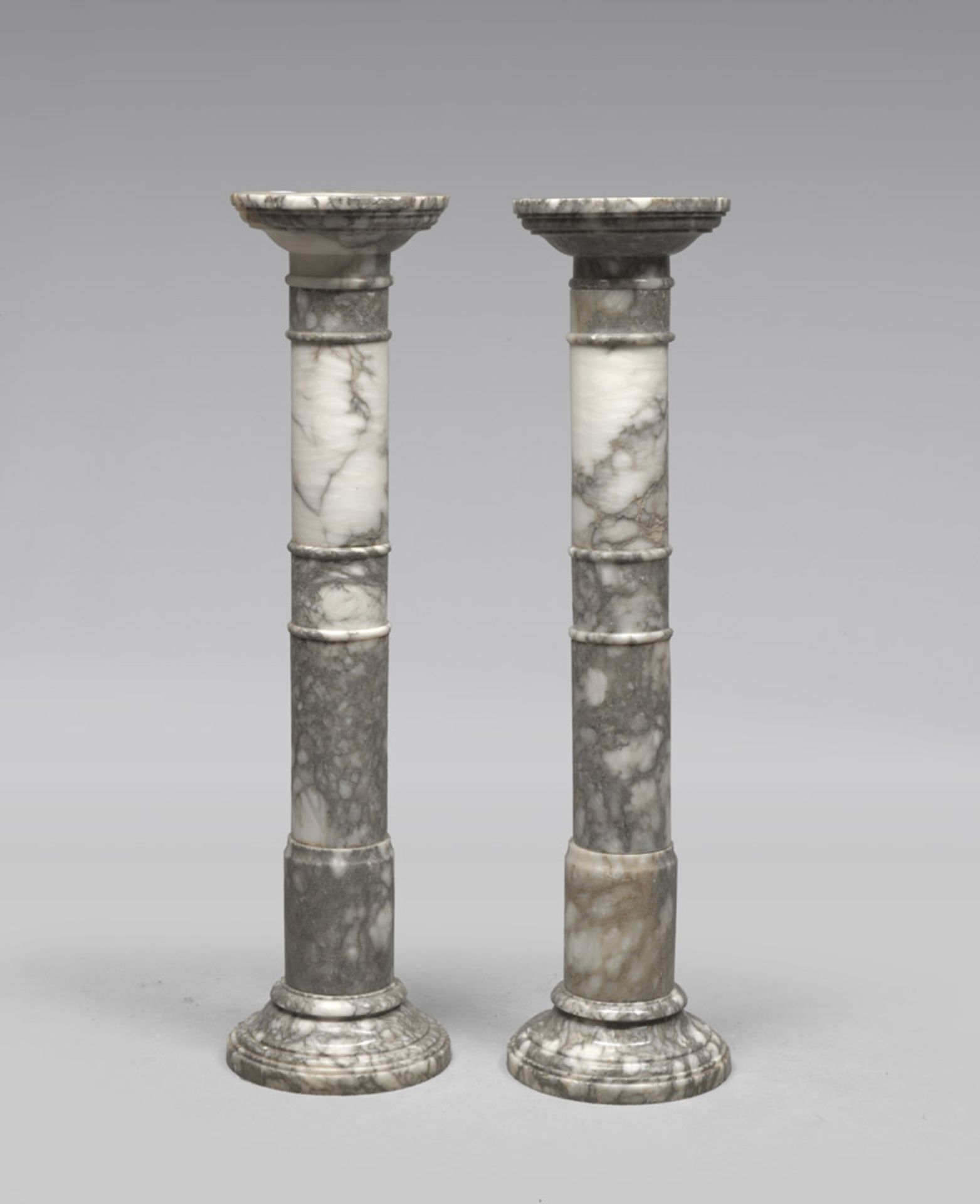 A PAIR OF WHITE MARBLE COLUMNS, 20TH CENTURY in three elements. h. cm. 102. COPPIA DI COLONNINE IN
