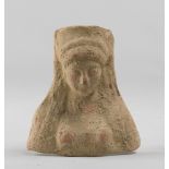 VOTIVE FEMALE BUST, VI CENTURY A.C. In red-orange figurine clay, molded beige, molded in mold.