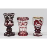 THREE GLASS GLASSES IN BOEMIA, MIDDLE XX YEAR engraved with vegetable motifs, deer and berry