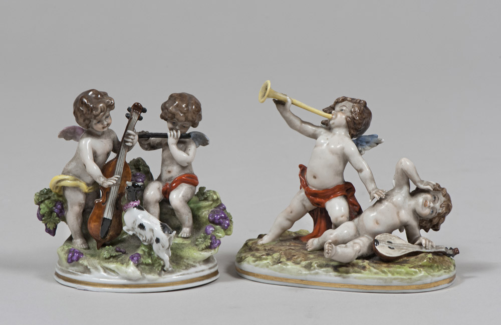 A PAIR OF PORCELAINE GROUPS, GINORI 20TH CENTURY polychrome, depicting scenes of playful cherubs.