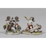 A PAIR OF PORCELAINE GROUPS, GINORI 20TH CENTURY polychrome, depicting scenes of playful cherubs.