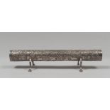 SILVER-PLATED PARCHMENT BOX, LATE 19TH CENTURY tubular body, decorated with forest with running