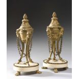 A PAIR OF ATHENIENNES, END OF LOUIS 19TH PERIOD Gilt bronze wih alabaster bases. Measures cm. 27 x