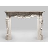 WHITE MARBLE FIREPLACE, LATE 19TH CENTURY with upright and frontal top sculptured with rocks,