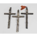 THREE SILVER CRUCIFIXES, EARLY 20TH CENTURY Measures cm. 30 x 17, total gross weight gr. 630. TRE