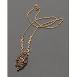 ANCIENT NECKLACE in yellow gold 18 kt., with oval shaped pendant in gold and silver studded with