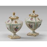 A PAIR OF SMALL PORCELAIN POTICHES, SEVRES EARLY 20TH CENTURY with decorums to flowers and edgings