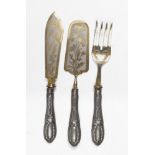 THREE SOLD IN SILVER, XX CENTURY with embossed handles and golden blades. Length cm. 29. TRE