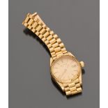 WOMAN'S WRIST WATCH, BRAND LONGINES entirely in yellow gold 18 kt., with champagne dial, applied