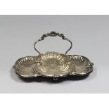 SILVERED METAL TRAY, 20TH CENTURY with tubs hurled to roccailles. Measures cm. 16 x 33 x 24.