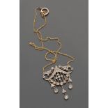 NECKLACE in yellow gold 18 kt., with pendant depicting large ramage, decorated with diamond pink