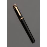 CARTIER PEN in silver-plated metal with laminated yellow gold inserts. Length cm. 14. Complete