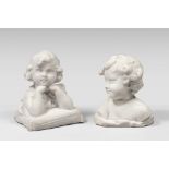 TWO WHITE MARBLE SCULPTURES OF CHILDREN, EARLY 20TH CENTURY one posing on a pillow. Measures cm.