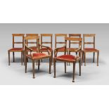 TWO BEECH ARMCHAIRS AND SIX CHAIRS, 19TH CENTURY with trapezoidal backrests with double-skinned,
