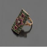 RING in yellow gold 18 kt. and silver, with a rectangular shape with rubies and emeralds embedded.