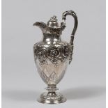 BEAUTIFUL SILVER MILKJUG, PUNCH LONDON 1873 with chiseled body to volute leaves and flowers.