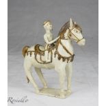 A Thai glazed ceramic sculpture of Knight with horse. Early 20th century. Measures cm. 30 x 9 x